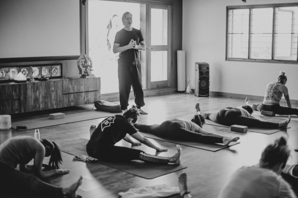 Students doing Dragonfly posture during Yin yoga class.