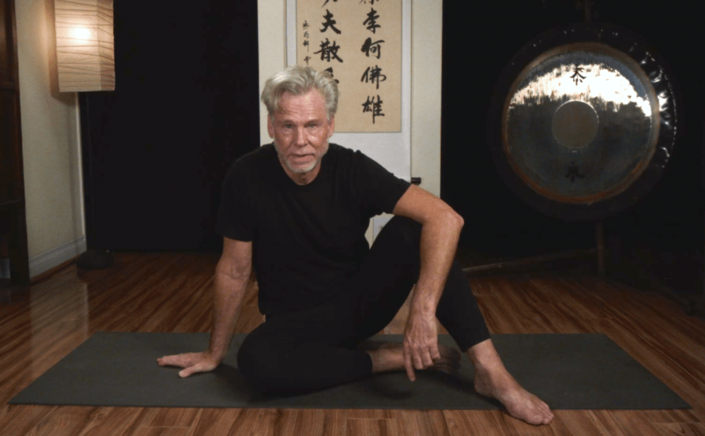 Christopher, during class, providing direction, and sharing whatever are the pertinent insights and understandings that affect the Yin  yoga experience.